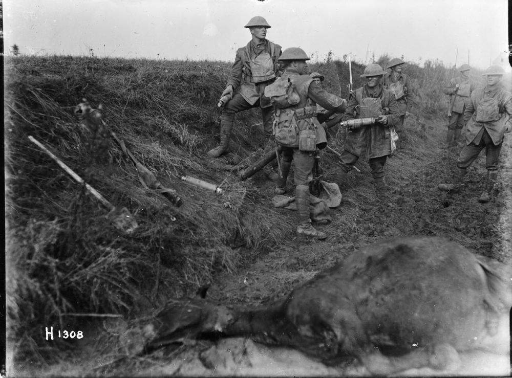 Men of the New Zealand Rifle Brigade operating a Stokes Trench Mortar near Le Quesnoy in 1918.